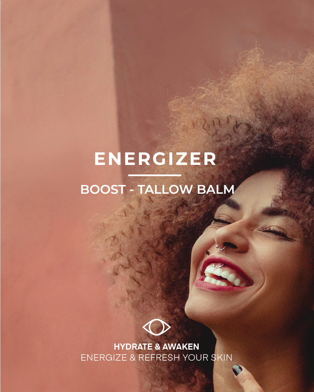 Product packaging for 'Energizer Boost Tallow Balm' with a woman smiling against a pink background.