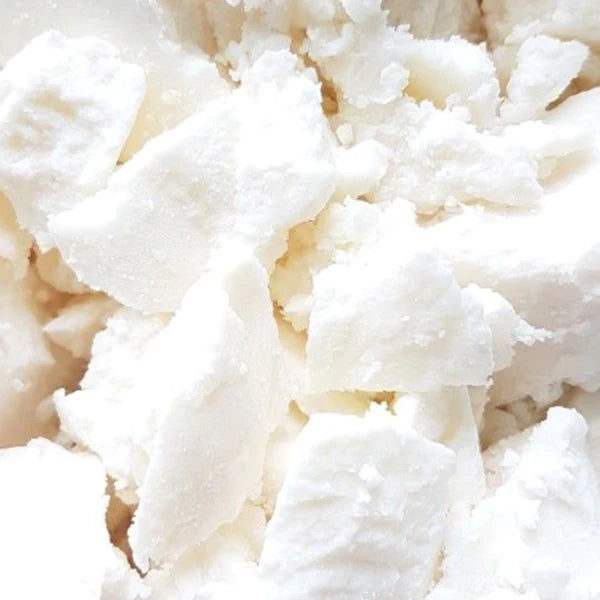 Close-up of Tallow, a white crumbly substance resembling cheese or a similar product.